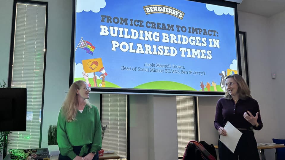 Jessie Macneil-Brown and Professor Michelle Richey speak to a lecture theatre.